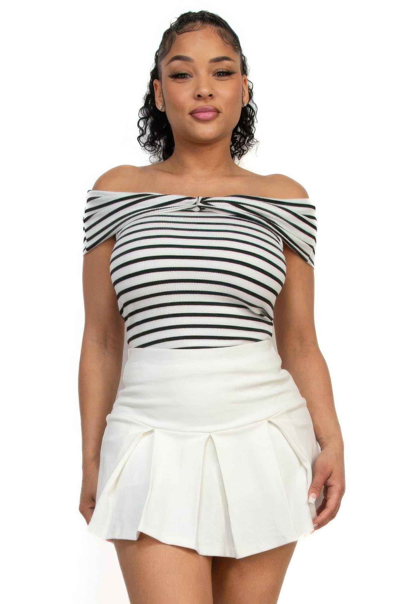 Front view: off-shoulder striped crop top with front-knot neckline and white pleated mini skirt