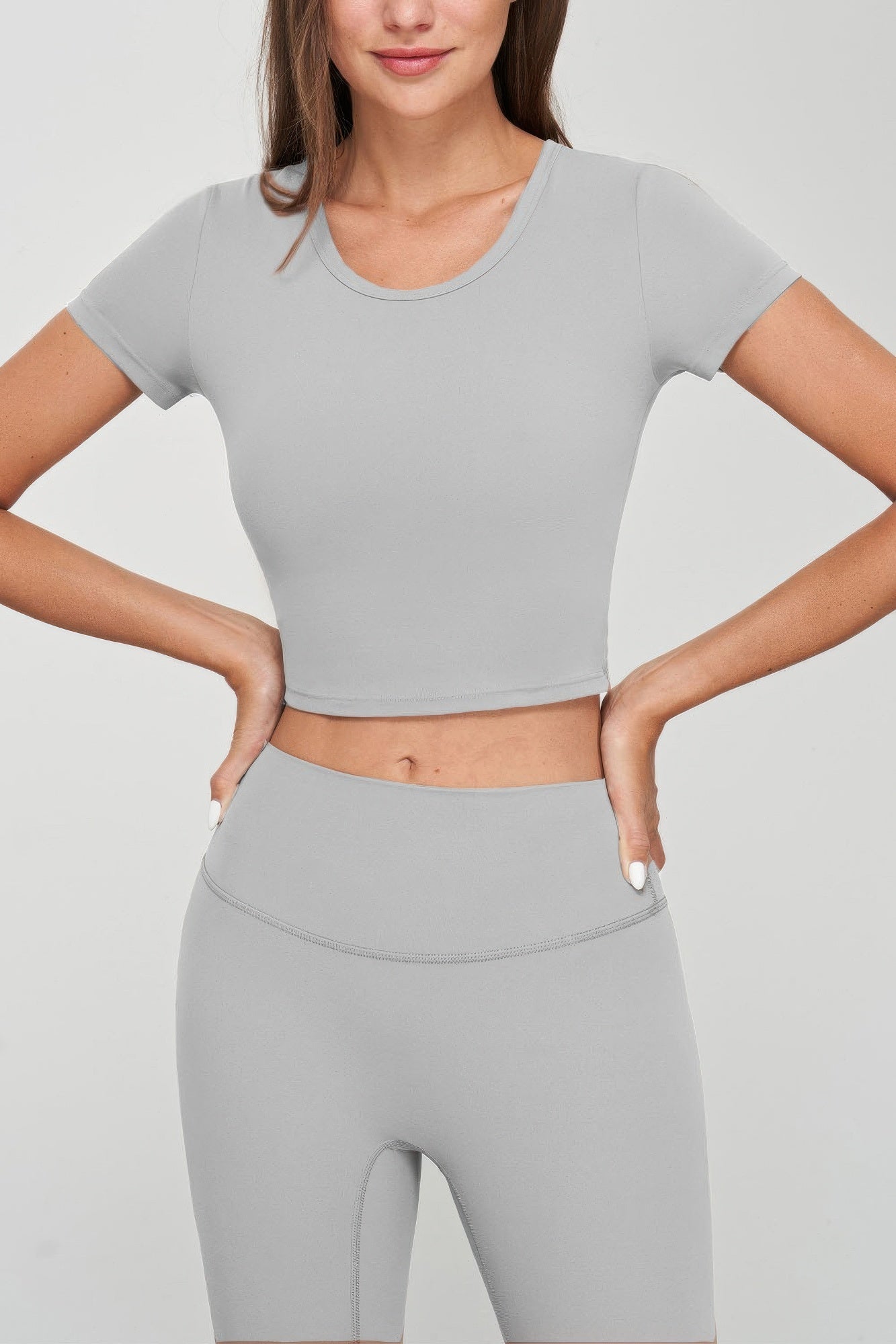 Grey seamless short-sleeve crop tee, crew neck—front view