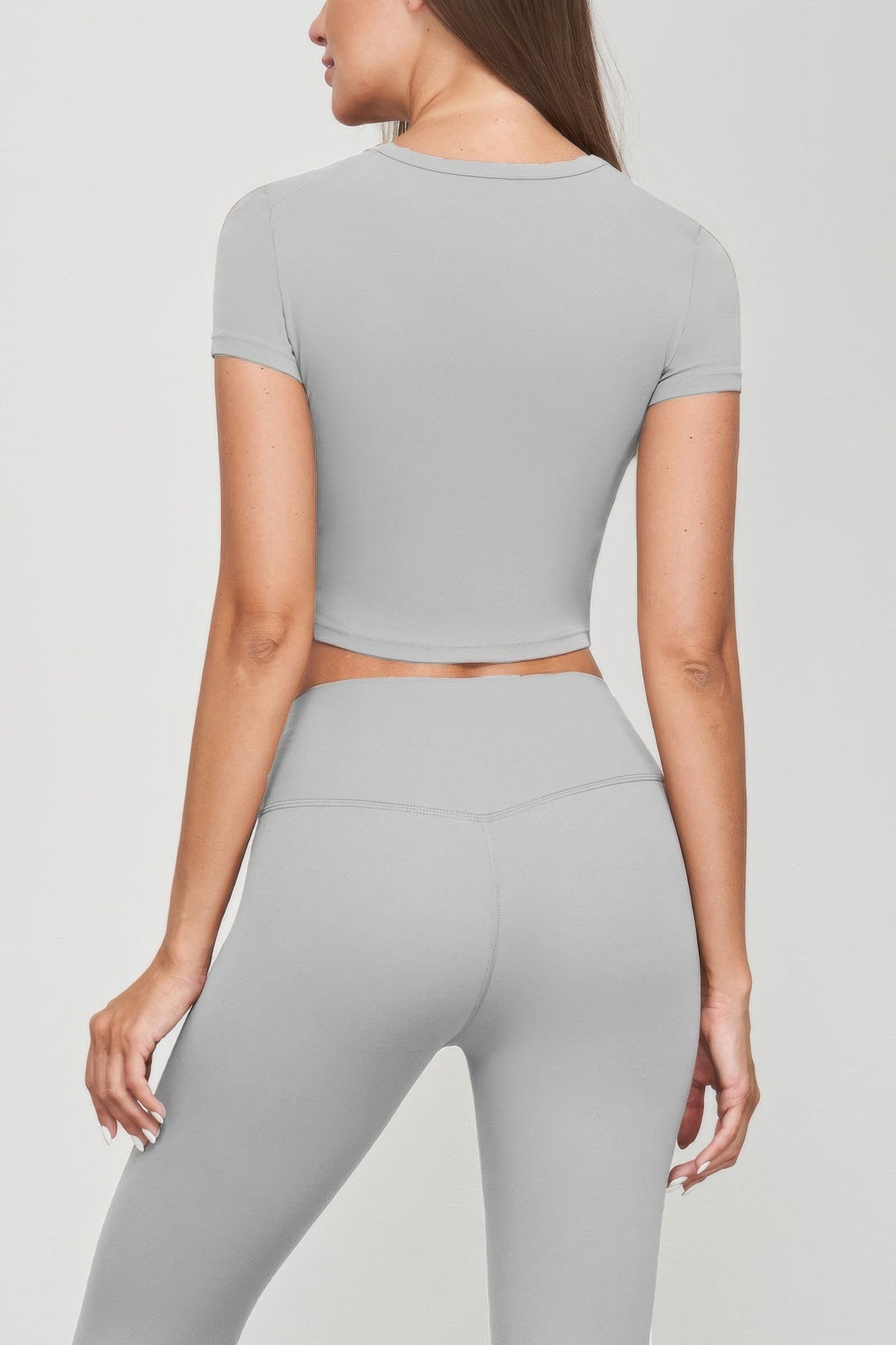 Grey seamless short-sleeve crop tee, crew neck—back view