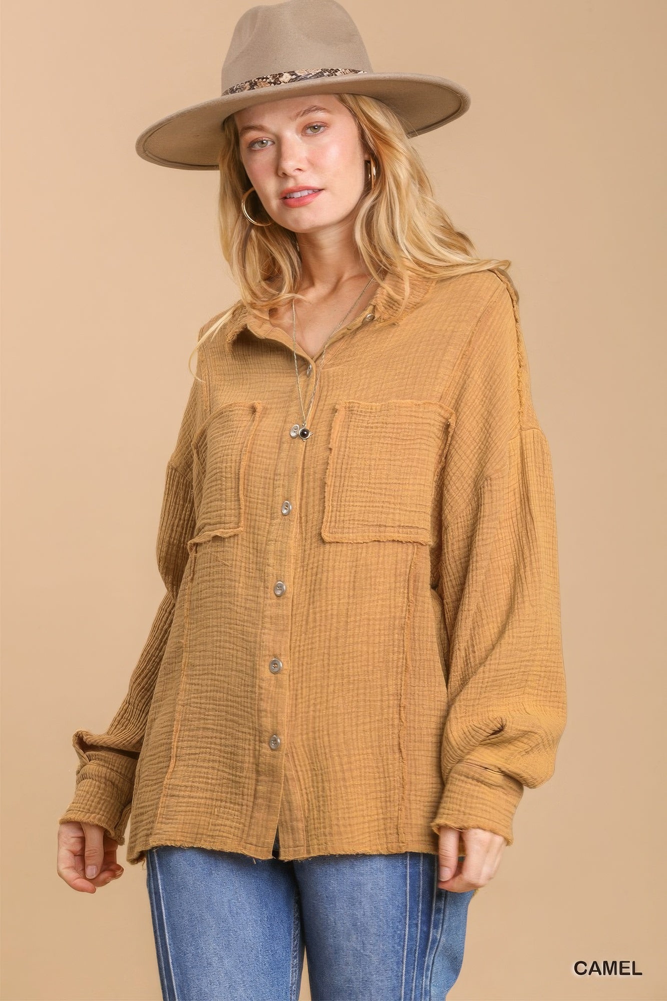 Camel button-down top with chest pockets and long sleeves