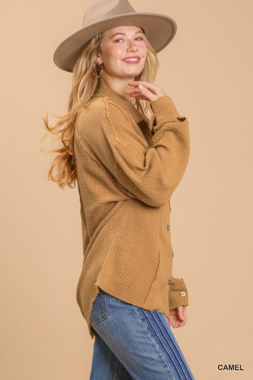 Camel button-down top with chest pocket and uneven hem