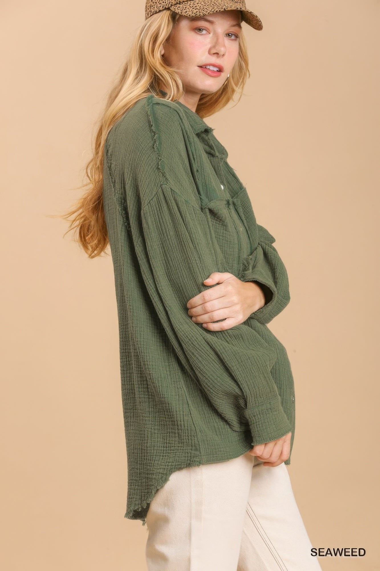 Seaweed button-down top side view with gathered yoke and high-low hem