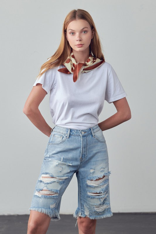 High-rise ripped denim bermuda shorts, light blue wash, frayed hems