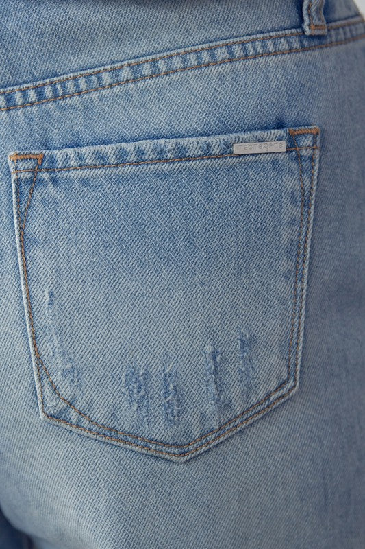 High-rise ripped bermuda denim shorts—front pocket and seam details