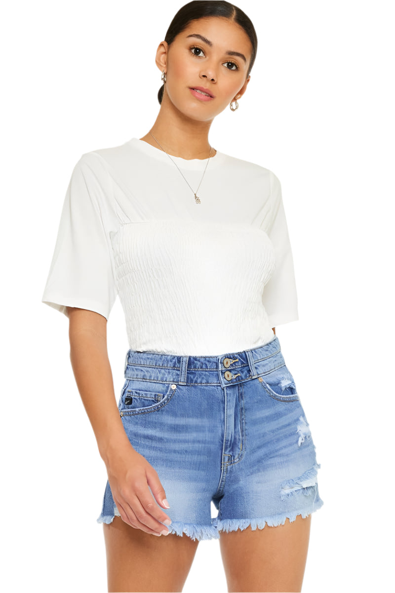 High-rise blue denim jean shorts with double-button fly and front pockets