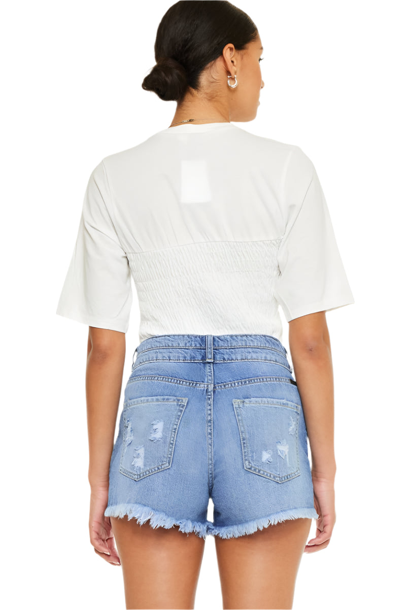 High-rise blue denim jean shorts, back view, button waistband and patch pockets