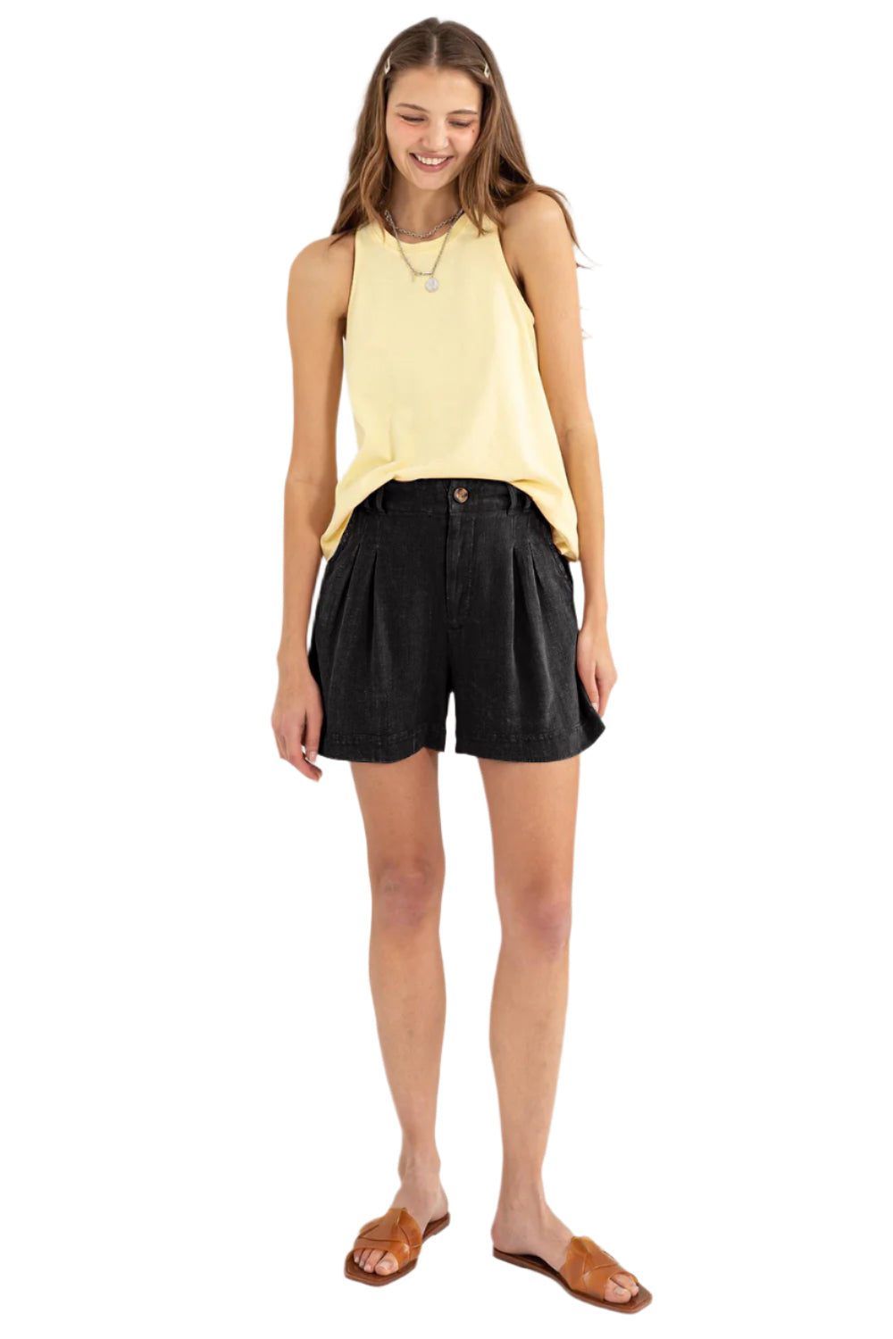 Hudson black size M pleated linen shorts, full front view on model