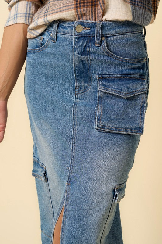Denim cargo skirt close-up: flap pocket, button waist, visible seams