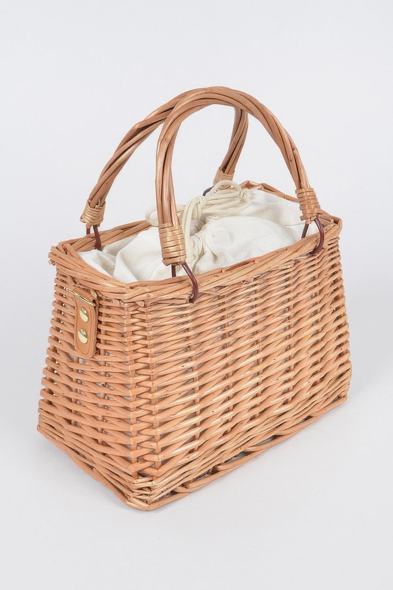Natural bamboo clutch bag with woven pattern and short top handles, front view
