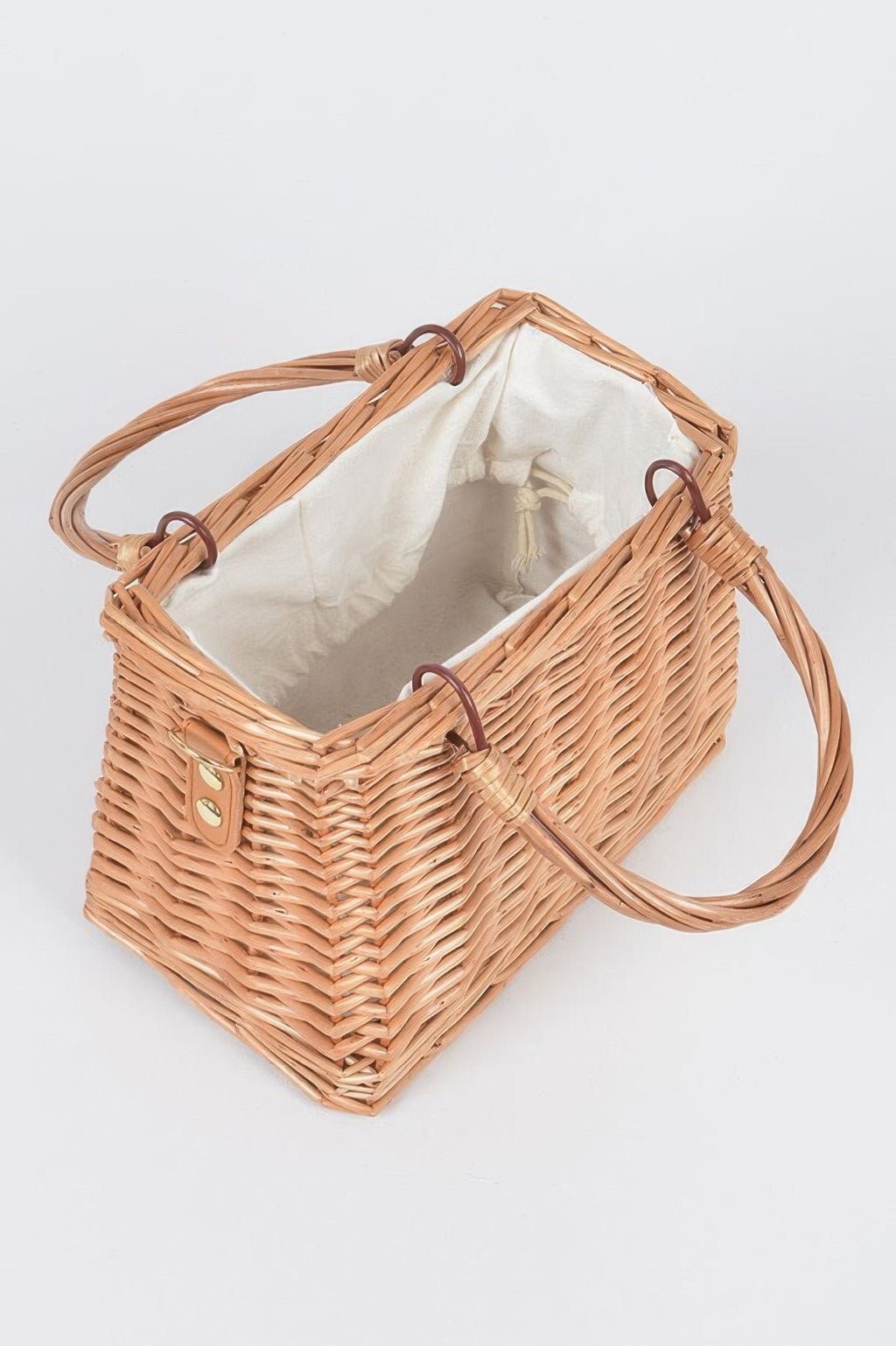 Natural bamboo clutch with front patch detail and long strap, open interior