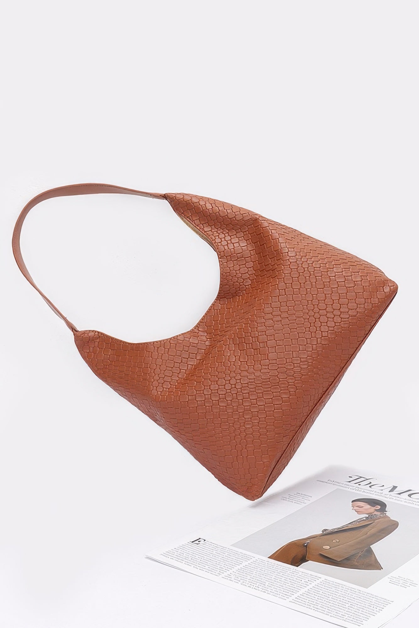 Embossed faux leather shoulder bag, rust-orange textured finish with roomy interior