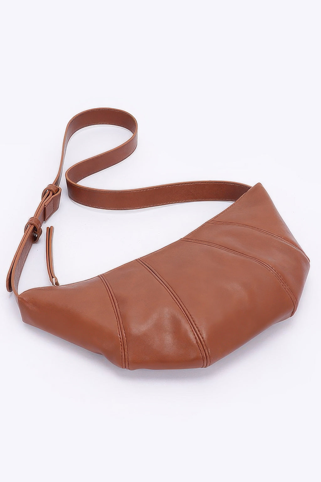 Caramel faux leather croissant bag with long strap and curved side panels