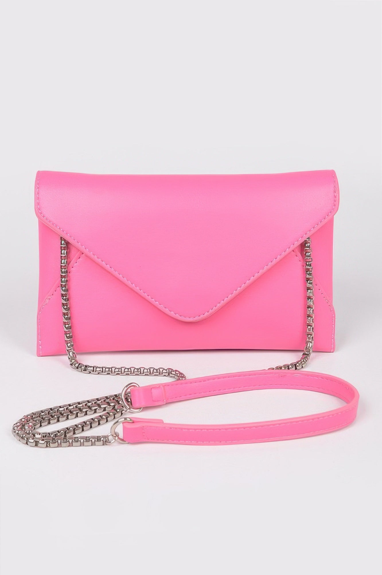 Fuchsia faux leather envelope clutch, front flap with dangling chain and crossbody strap