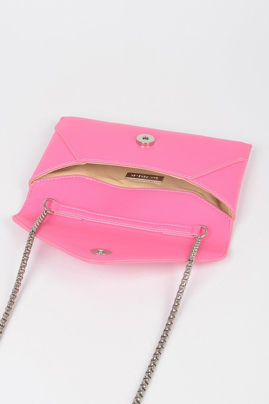 Fuchsia small envelope clutch with snap closure; chain and shoulder strap attached