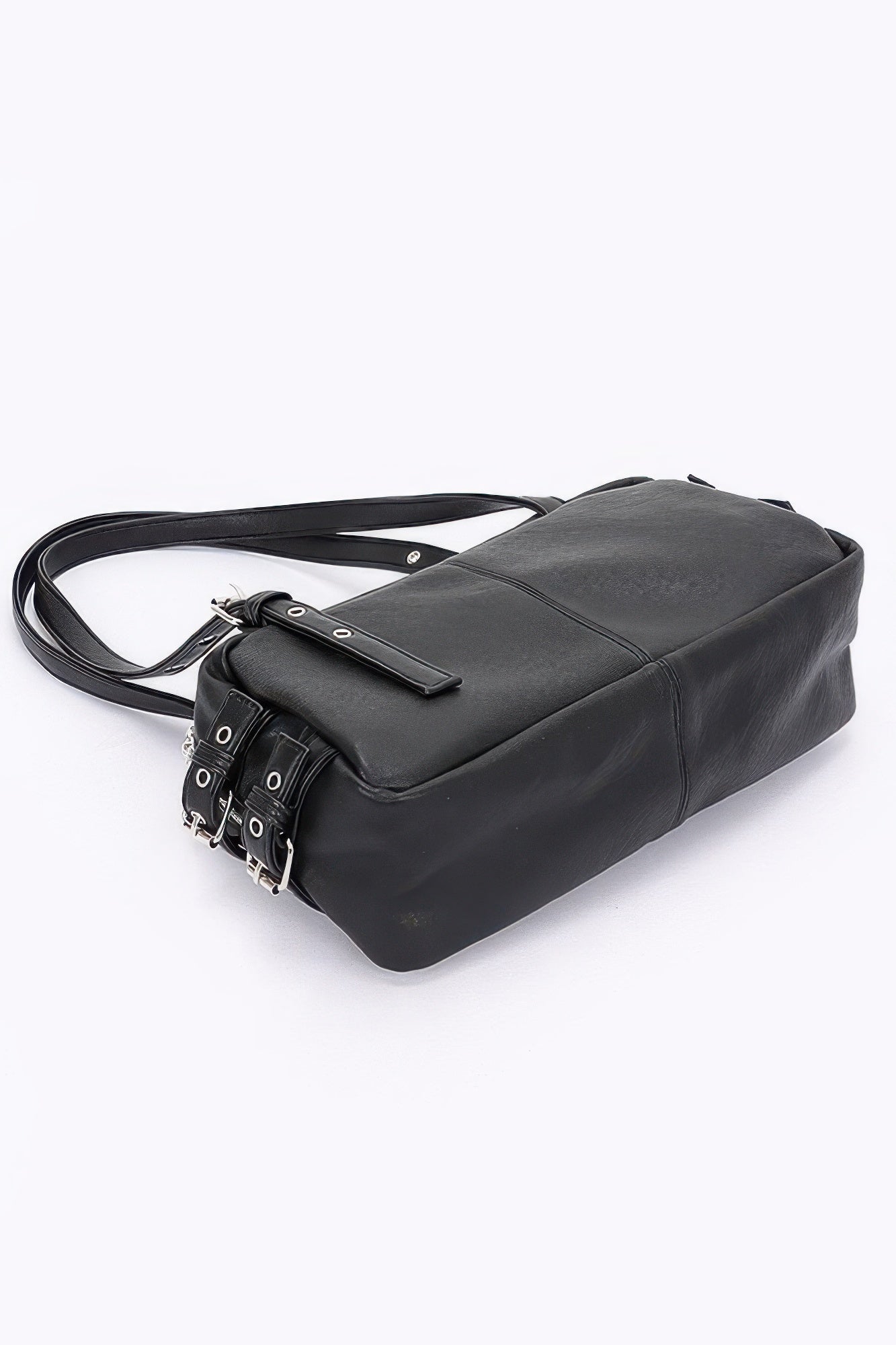 Black faux leather sport bag with long strap, zip front panel, and structured shape