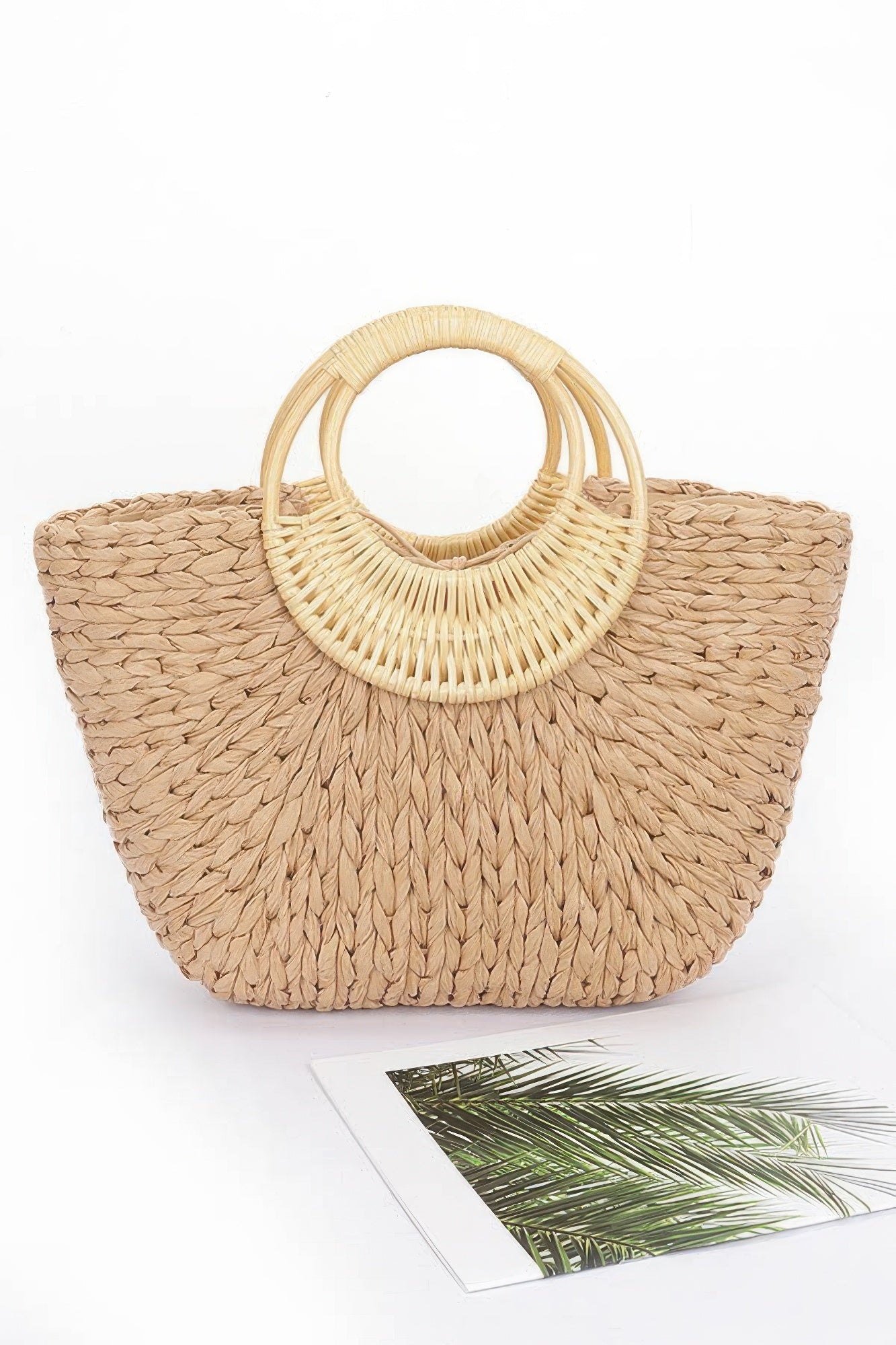 Khaki faux straw tote bag with bamboo handle loop and woven basket opening