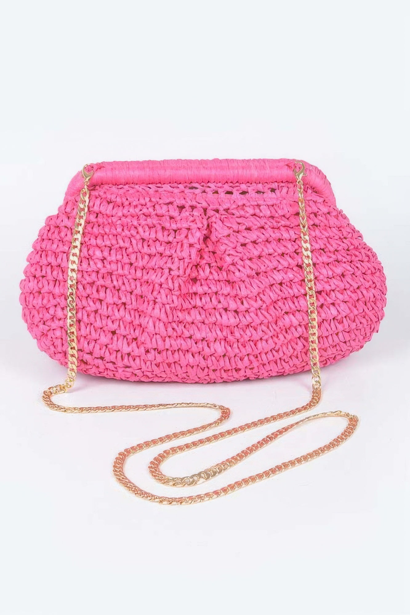 Faux straw clutch handbag in fuchsia with gold chain strap