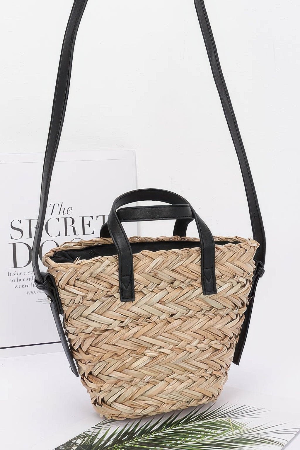 Faux straw small tote bag in camel with black top handles and woven sides