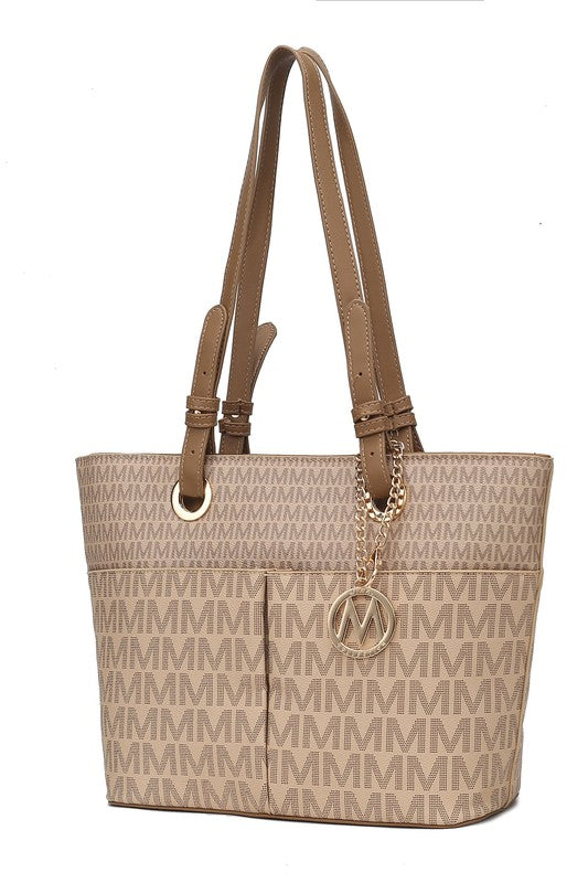 Lori printed tote bag in tan with M-pattern, tan straps, round logo charm on chain