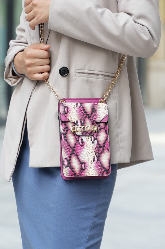 MKF Collection Yael phone crossbody bag in pink-purple snake print with chain strap