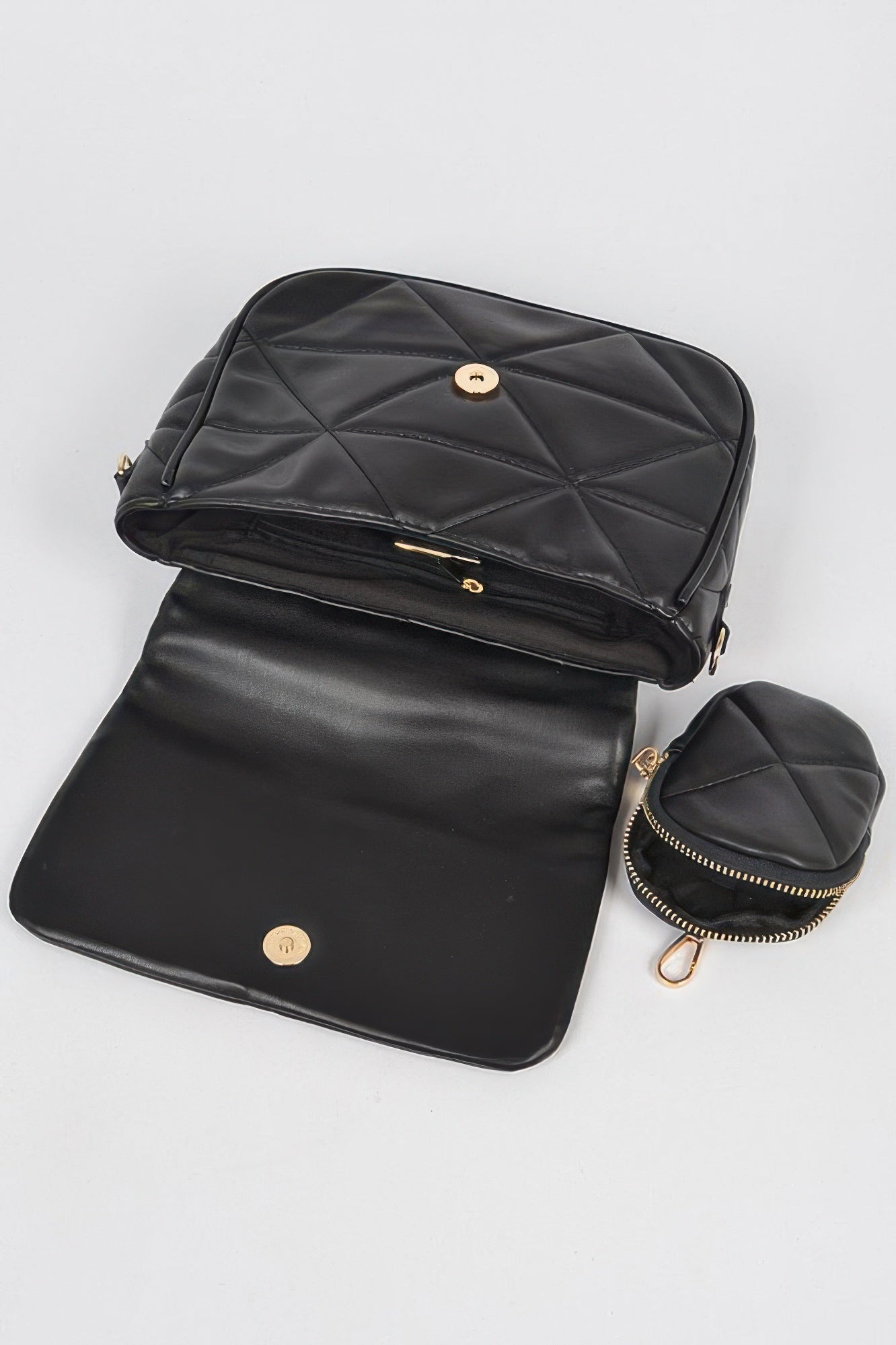 Black quilted crossbody set with long strap, flap front, and small round pouch