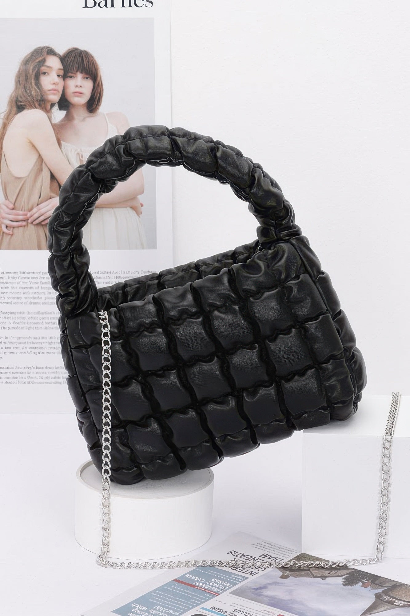 Quilted faux leather padded handle bag with chain strap, black.