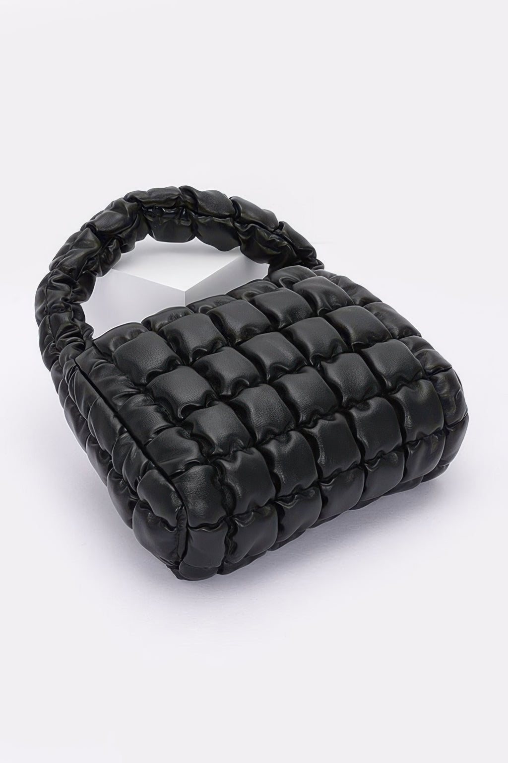 Quilted faux leather padded handle bag, black, wide top and padded strap.