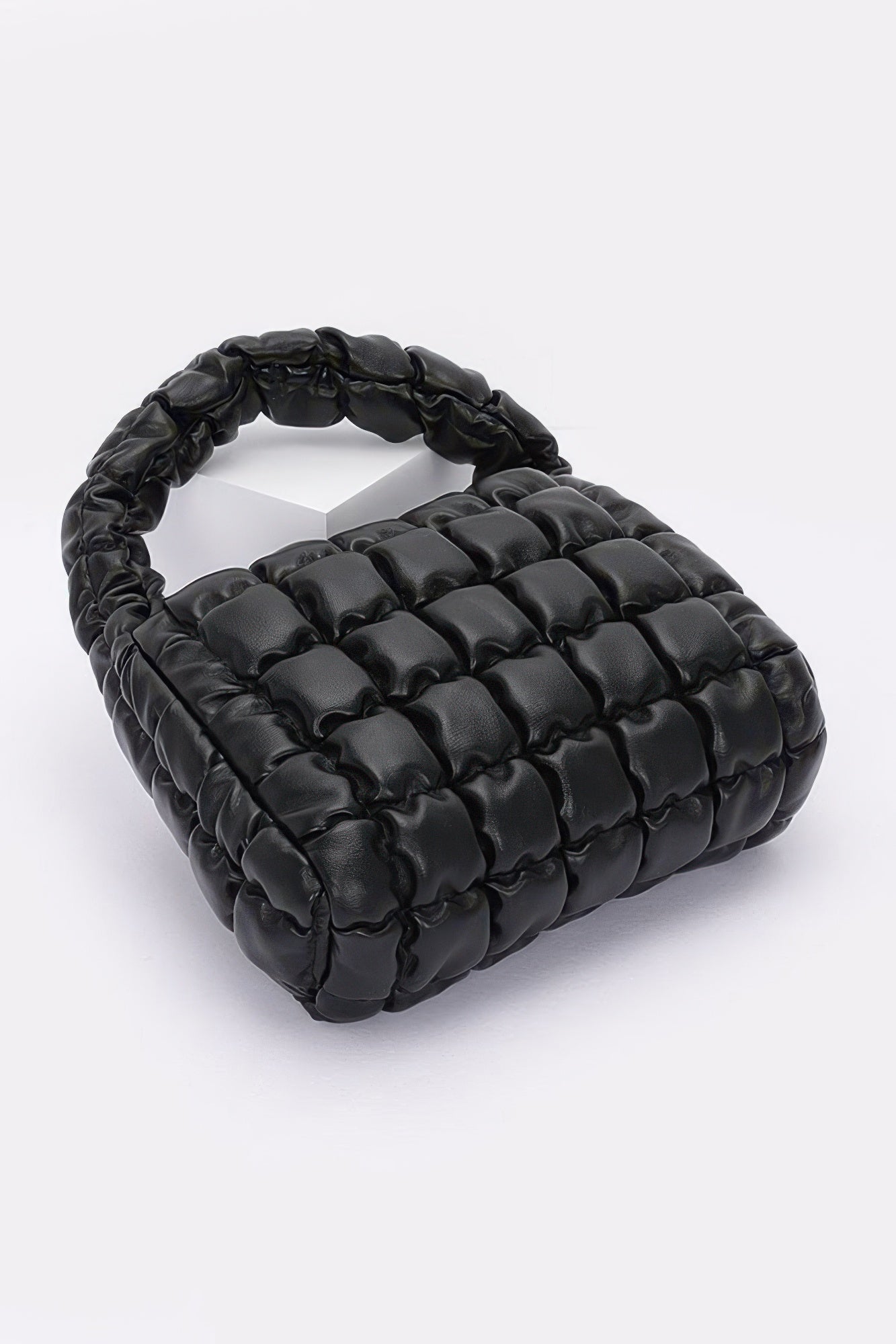 Quilted faux leather padded handle bag, black, wide top and padded strap.