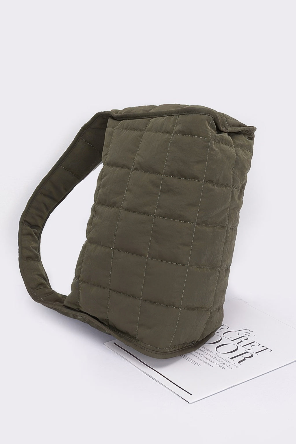 Olive quilted nylon shoulder bag with top handle and boxy quilted shape