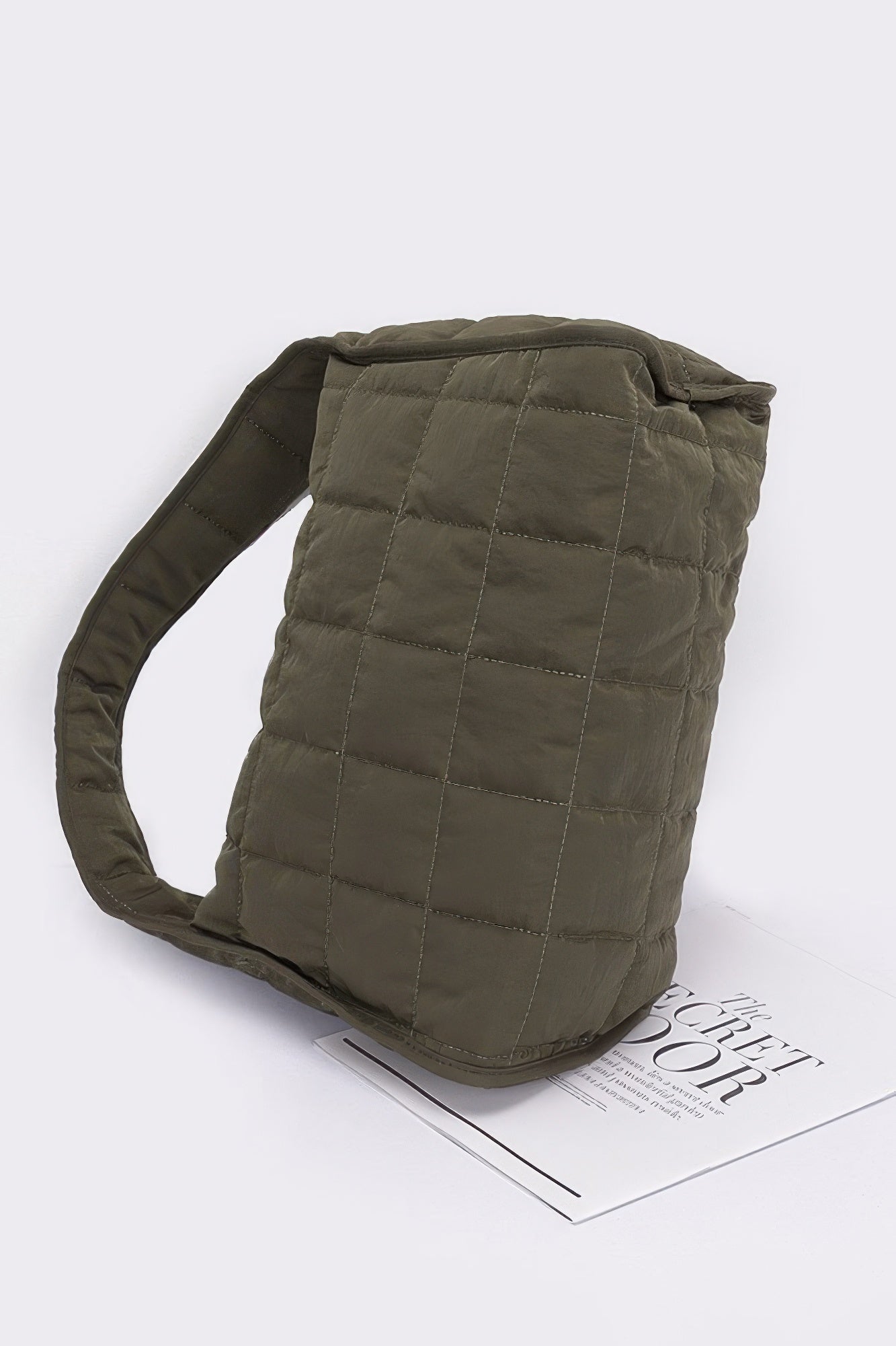 Olive quilted nylon shoulder bag with top handle and boxy quilted shape