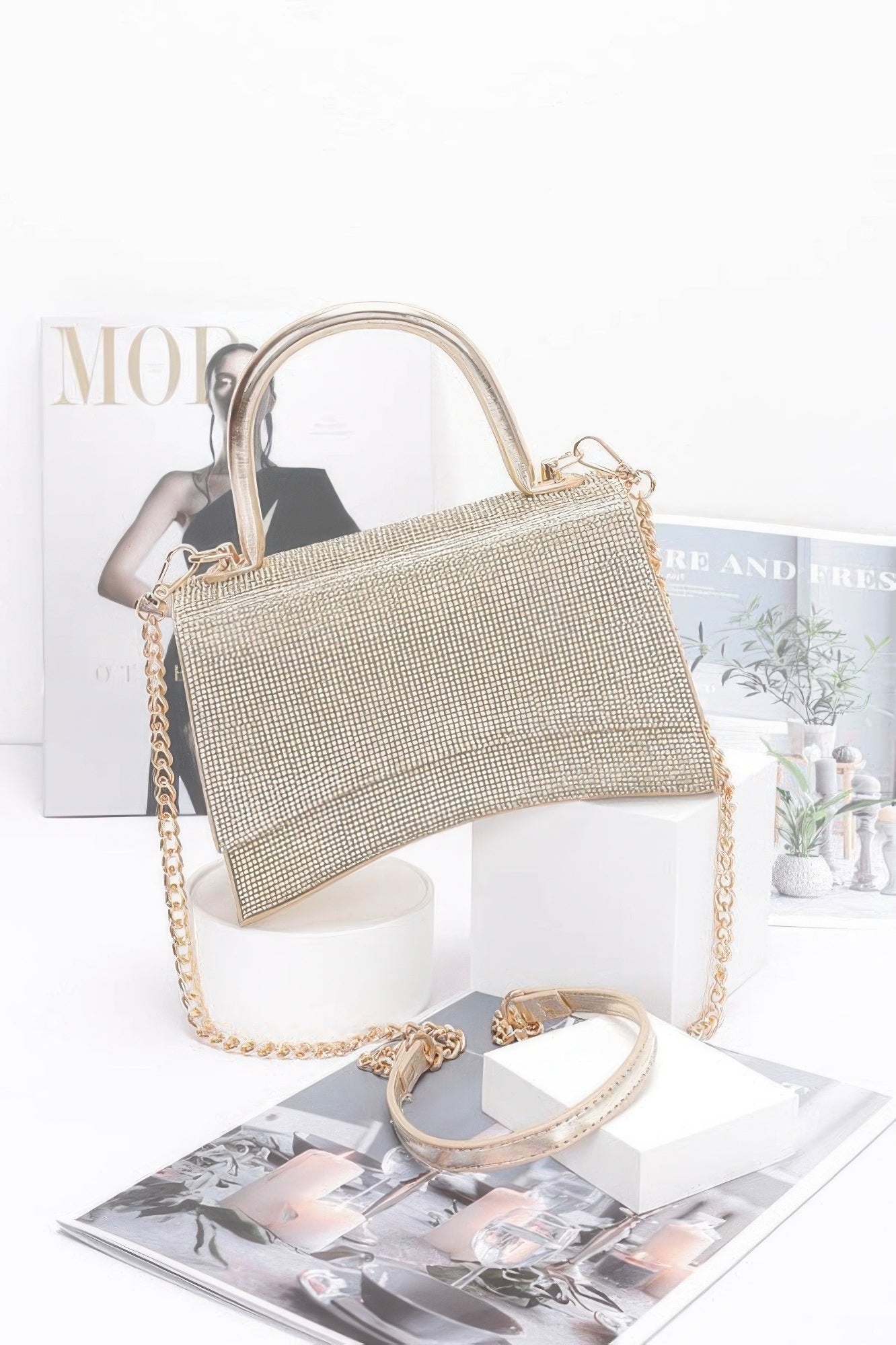 Gold-toned rhinestone top-handle flap bag with chain shoulder strap