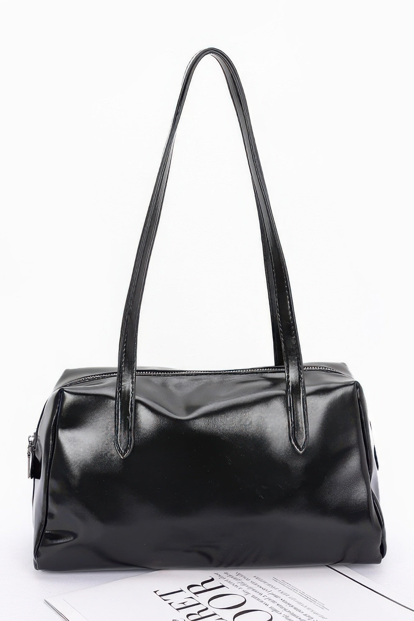 Shiny faux leather sport handbag in black, tall handles and front zipper pocket