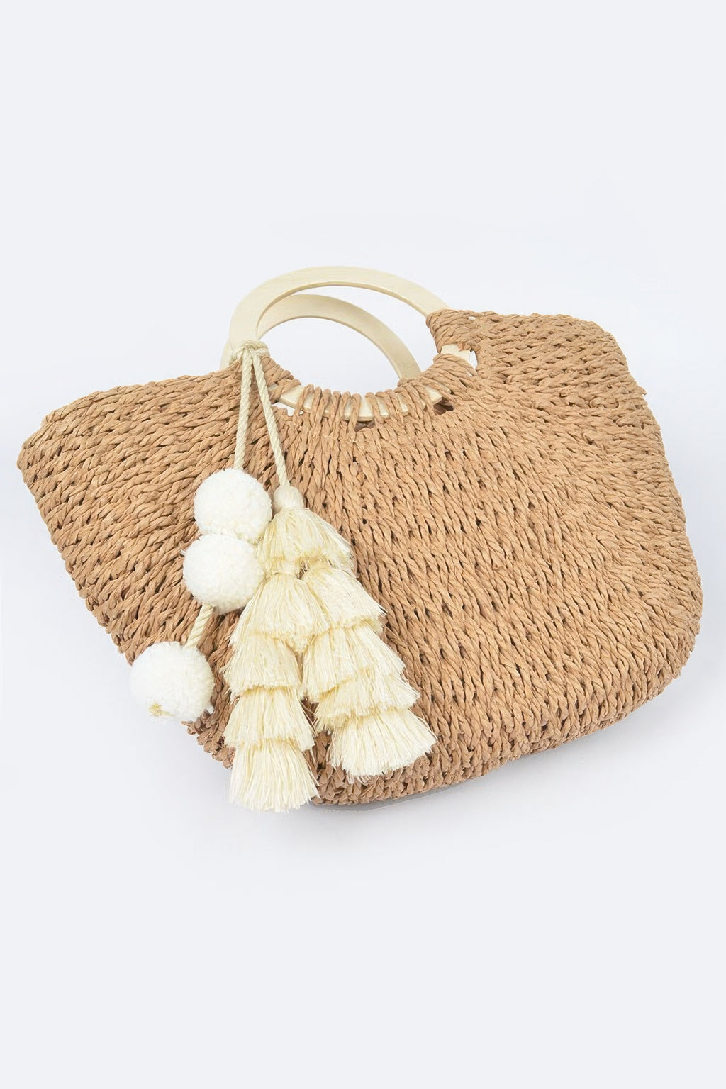 Woven cotton tote bag with wood handle, braided tassel trim and pom‑poms, khaki