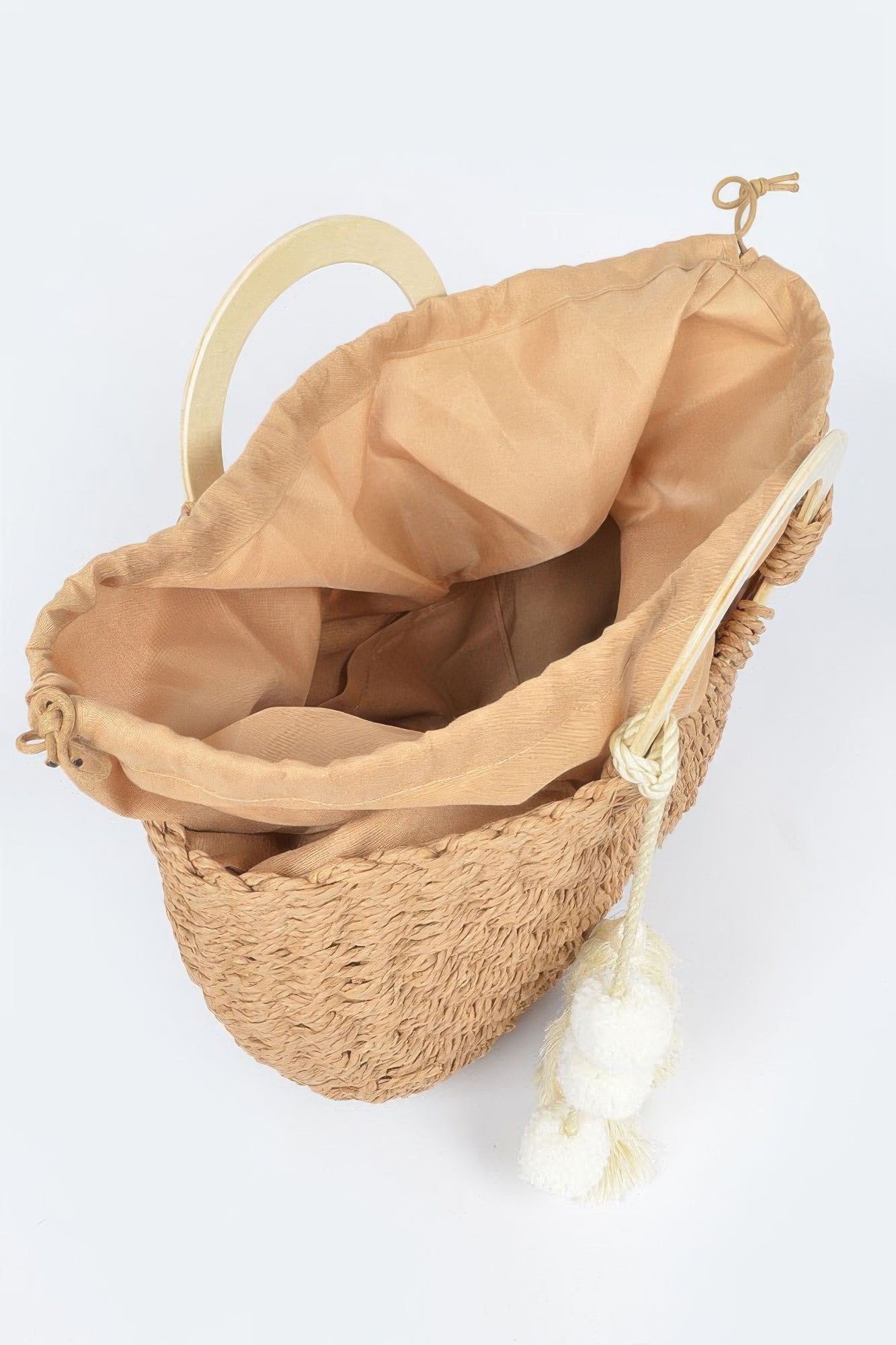 Woven cotton tote bag, open top, beige lining and tassel pom‑poms, khaki