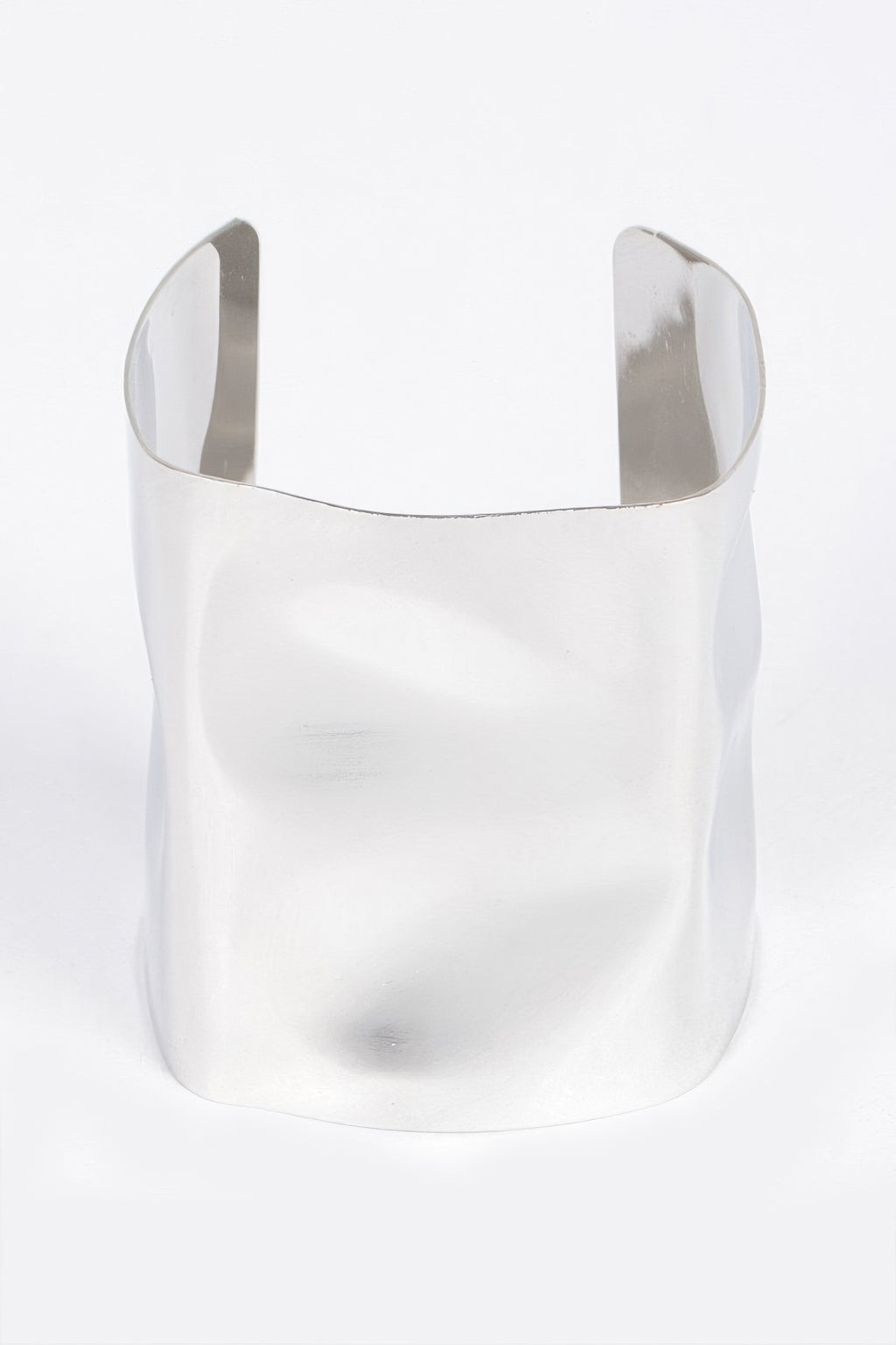 Silver-tone metal cuff bracelet, wide open design with polished curved finish