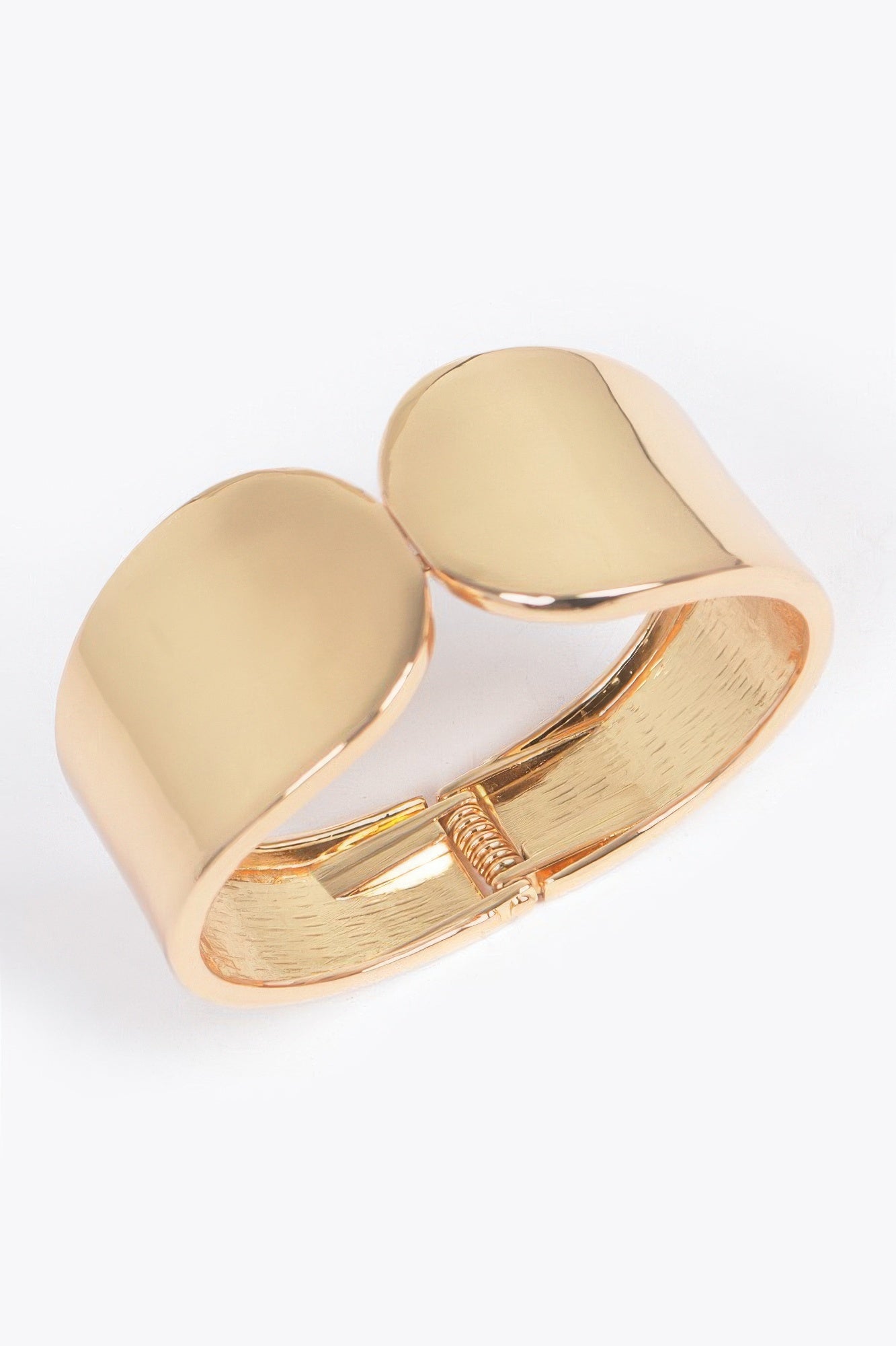 Gold metal spring hinge cuff bracelet, open hinge with spring coil
