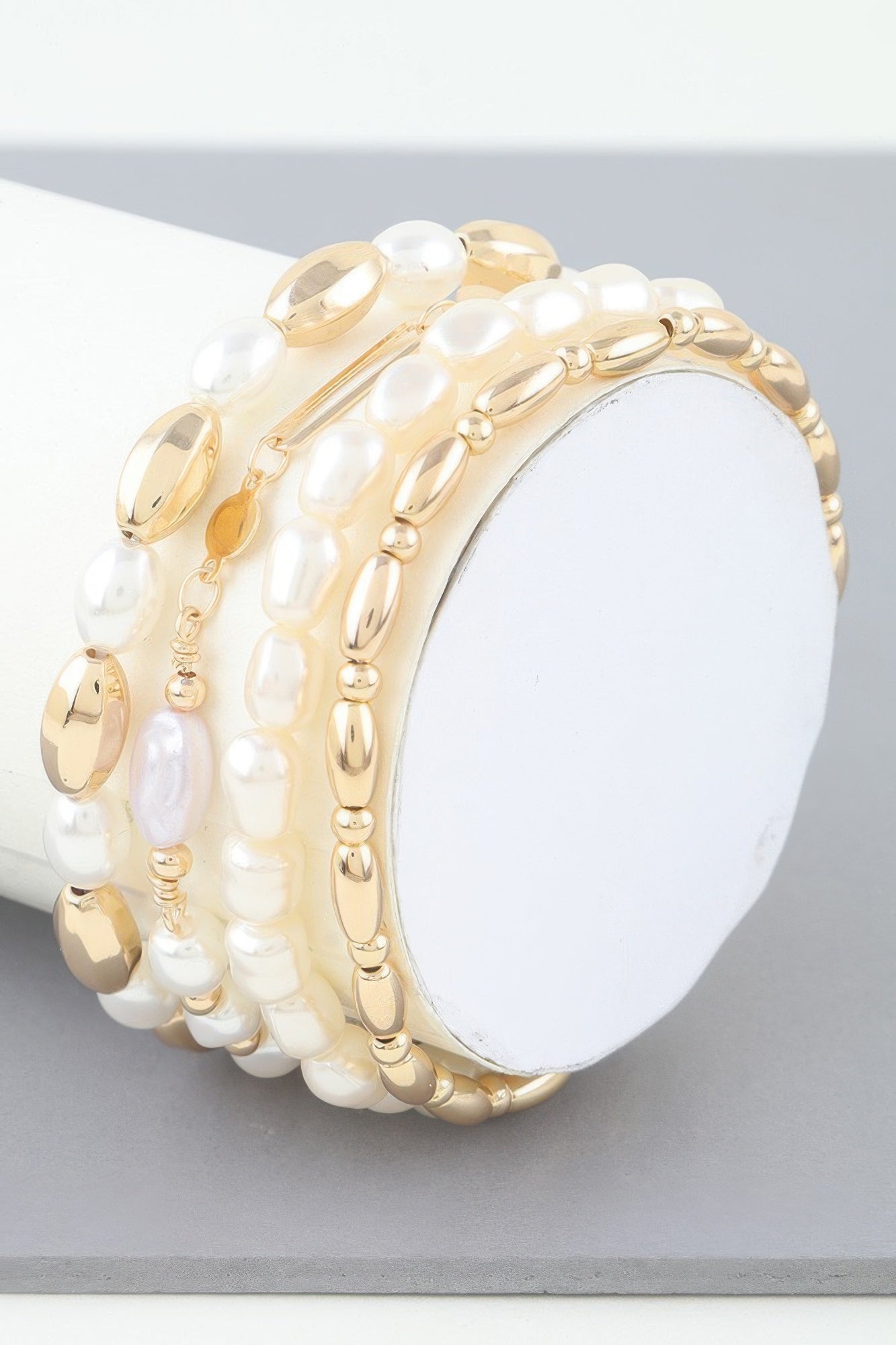 Cream pearl bead bracelet with gold oval spacers, wide multi-strand cuff