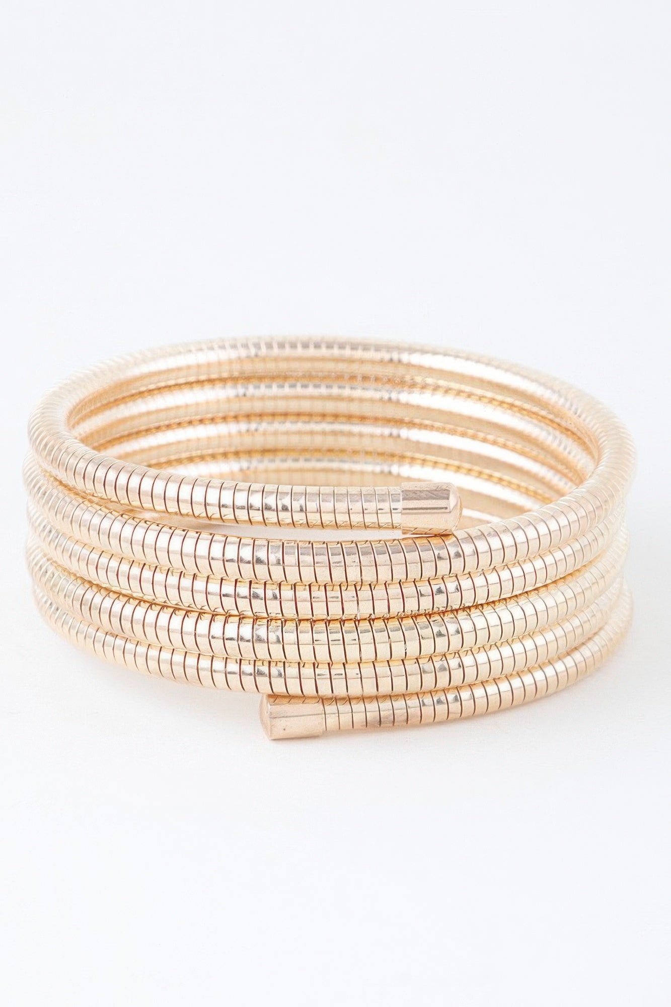 Multi snake chain wrap bracelet in gold tone with rectangular clasp detail