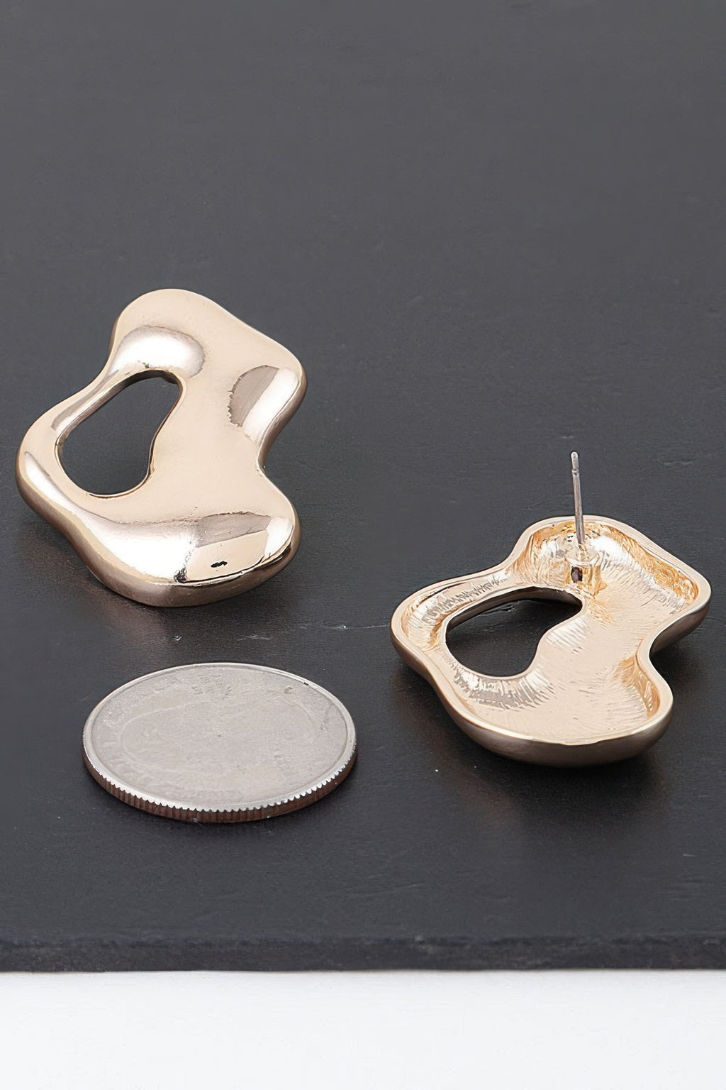 Abstract Modern Puddle Earrings in gold tone, pair shown with post back visible