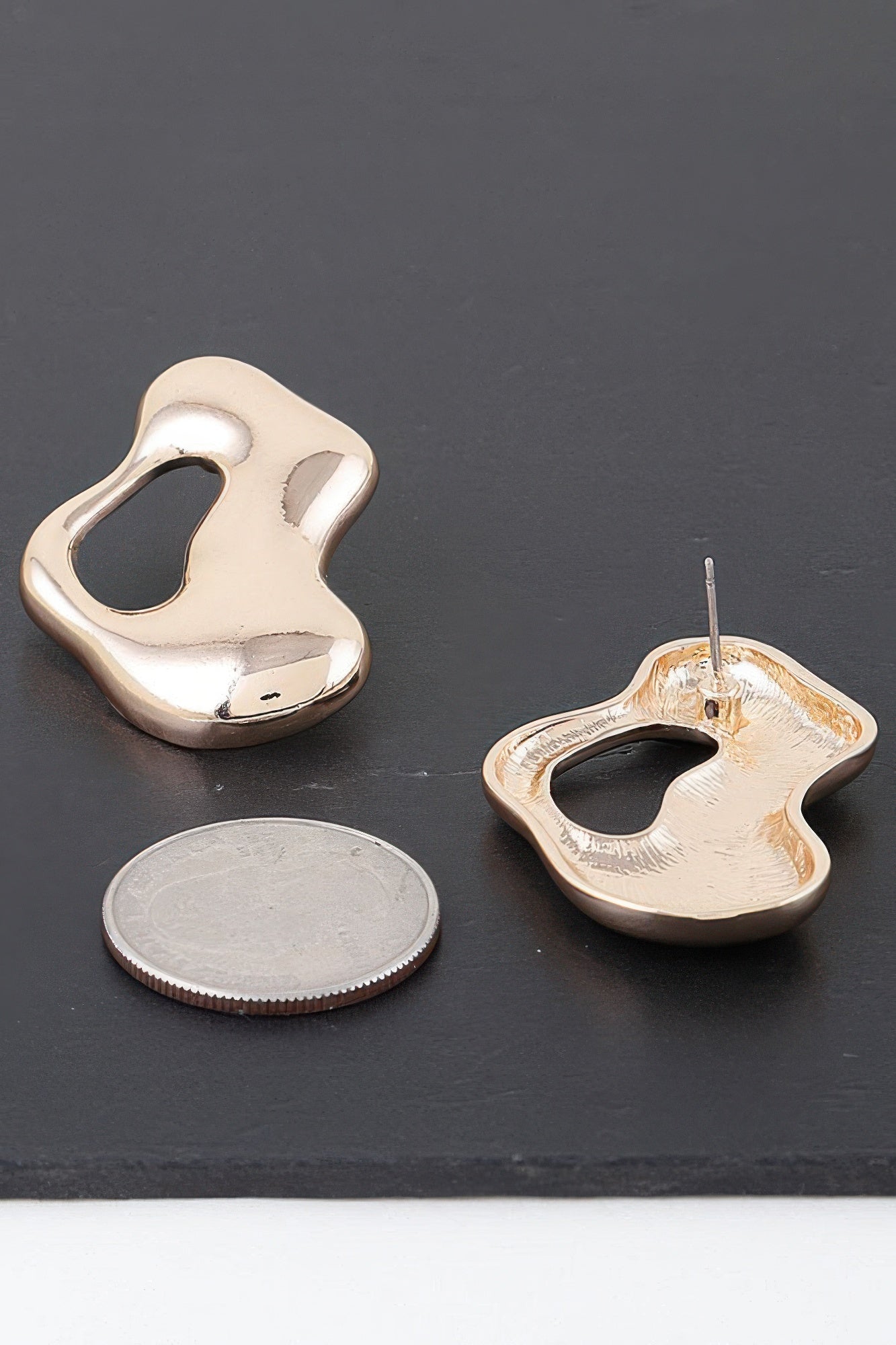 Abstract Modern Puddle Earrings in gold tone, pair shown with post back visible