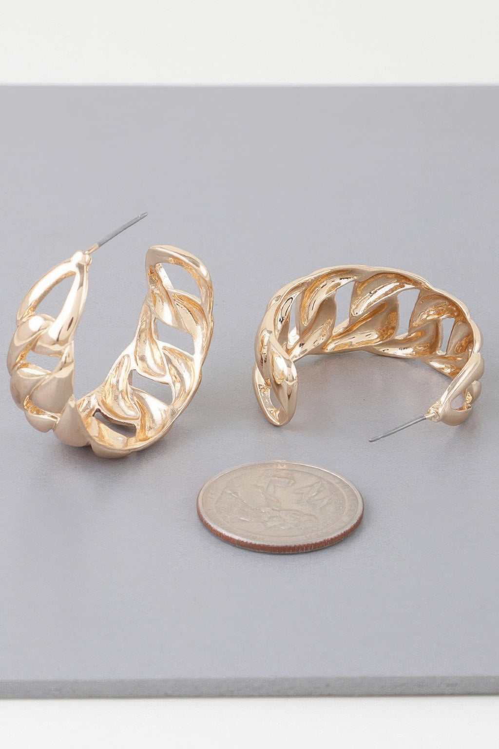 Gold-tone curb braid chain hoop earrings, curved twisted links with hinge-style post