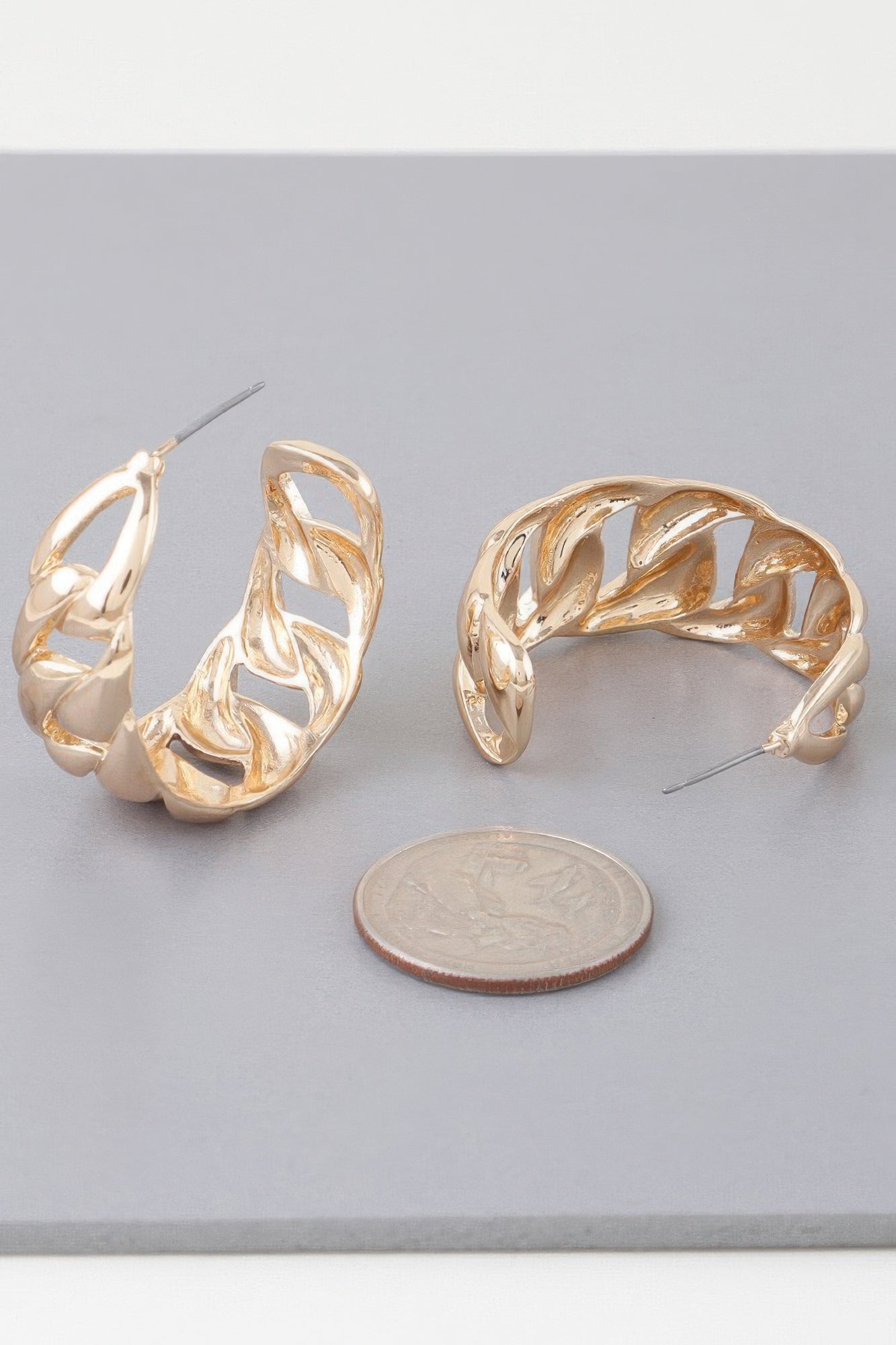 Gold-tone curb braid chain hoop earrings, curved twisted links with hinge-style post