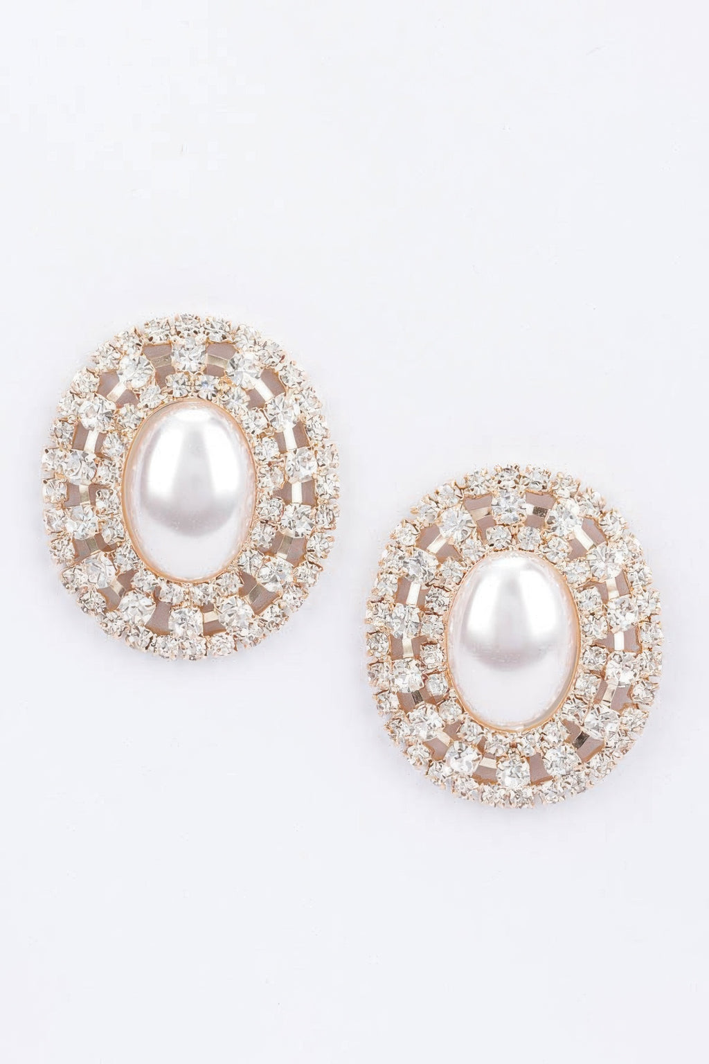 Gold-tone faux pearl rhinestone stud earrings with oval center and round crystal border