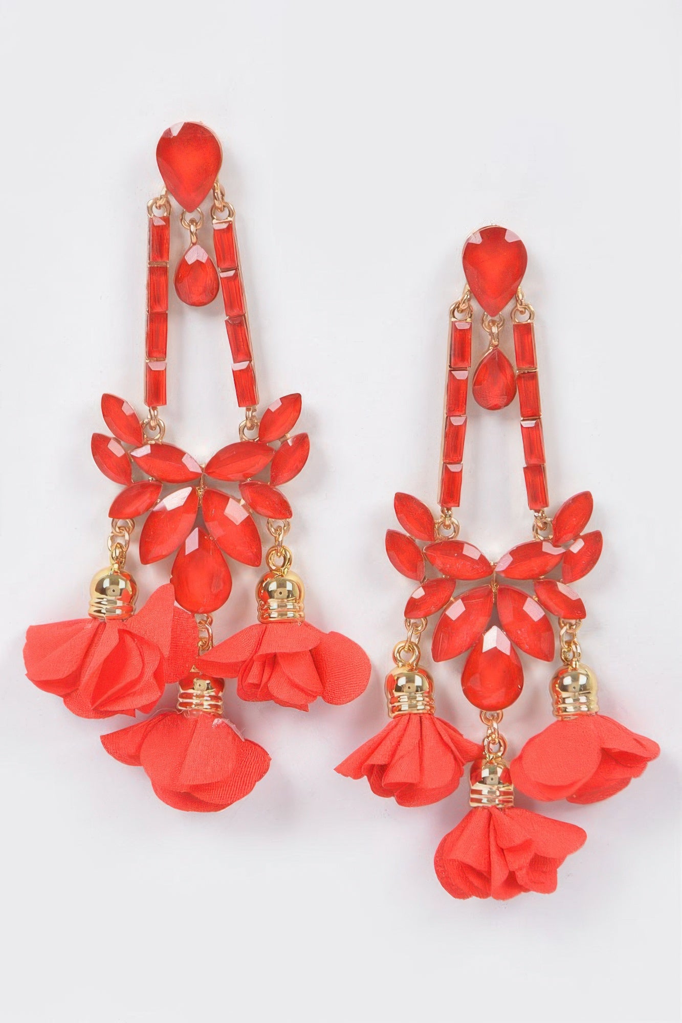 Red flower statement earrings with heart-shaped tops, crystal-like petal drops