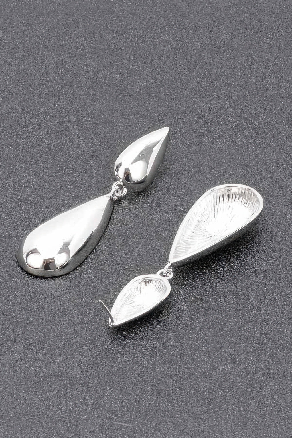 Silver teardrop dangle earrings with two stacked drops and ring-link connectors