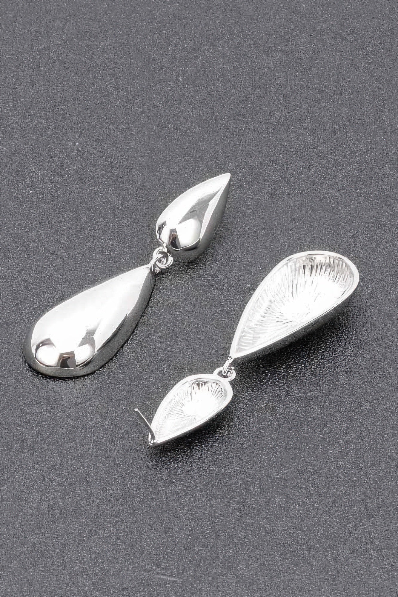 Silver teardrop dangle earrings with two stacked drops and ring-link connectors