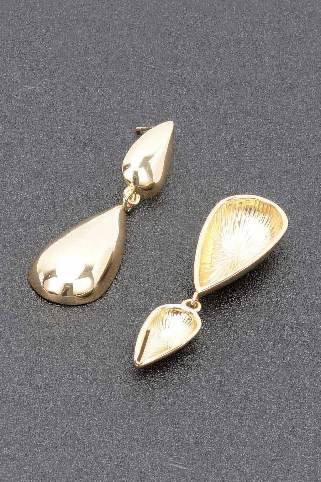 Gold teardrop dangle earrings with two stacked drops and ring-link connectors