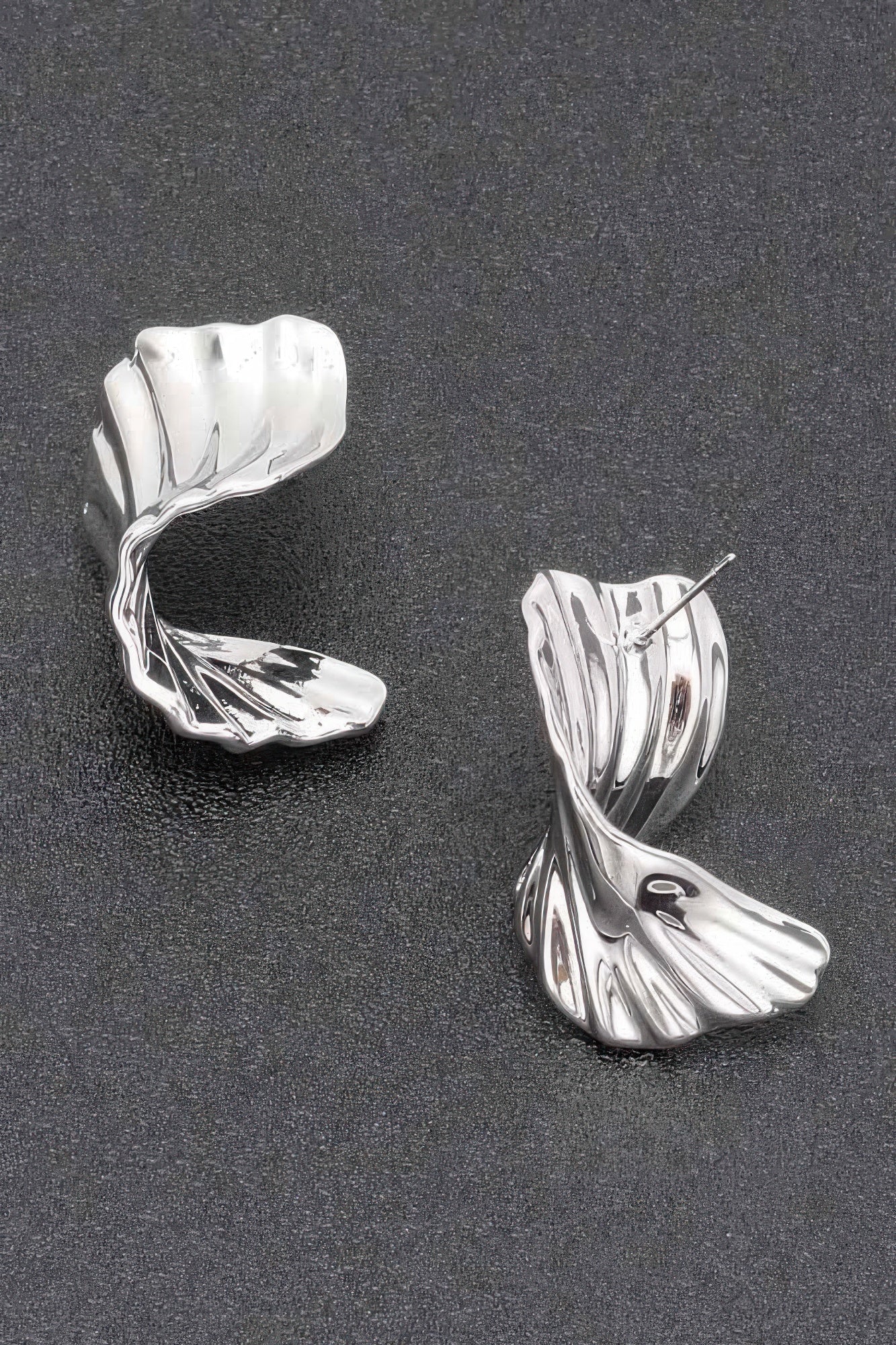 Silver-plated metal hoop earrings, ribbed wave design, pair