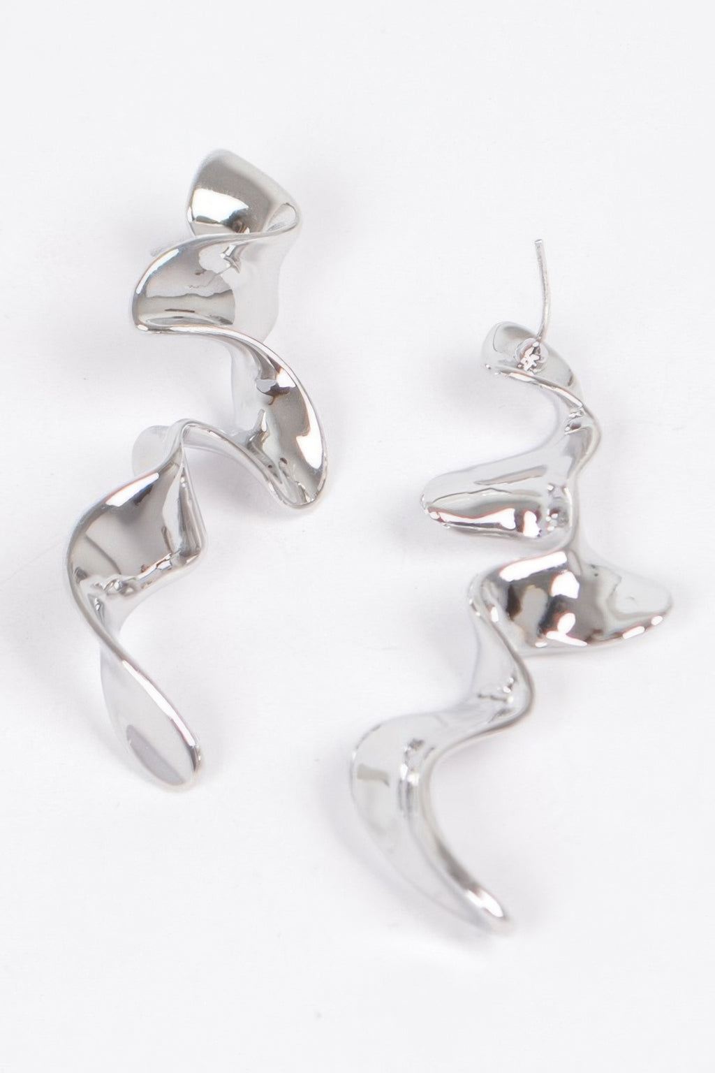 Silver-tone metal plated wave drop earrings with curved swirl dangle design