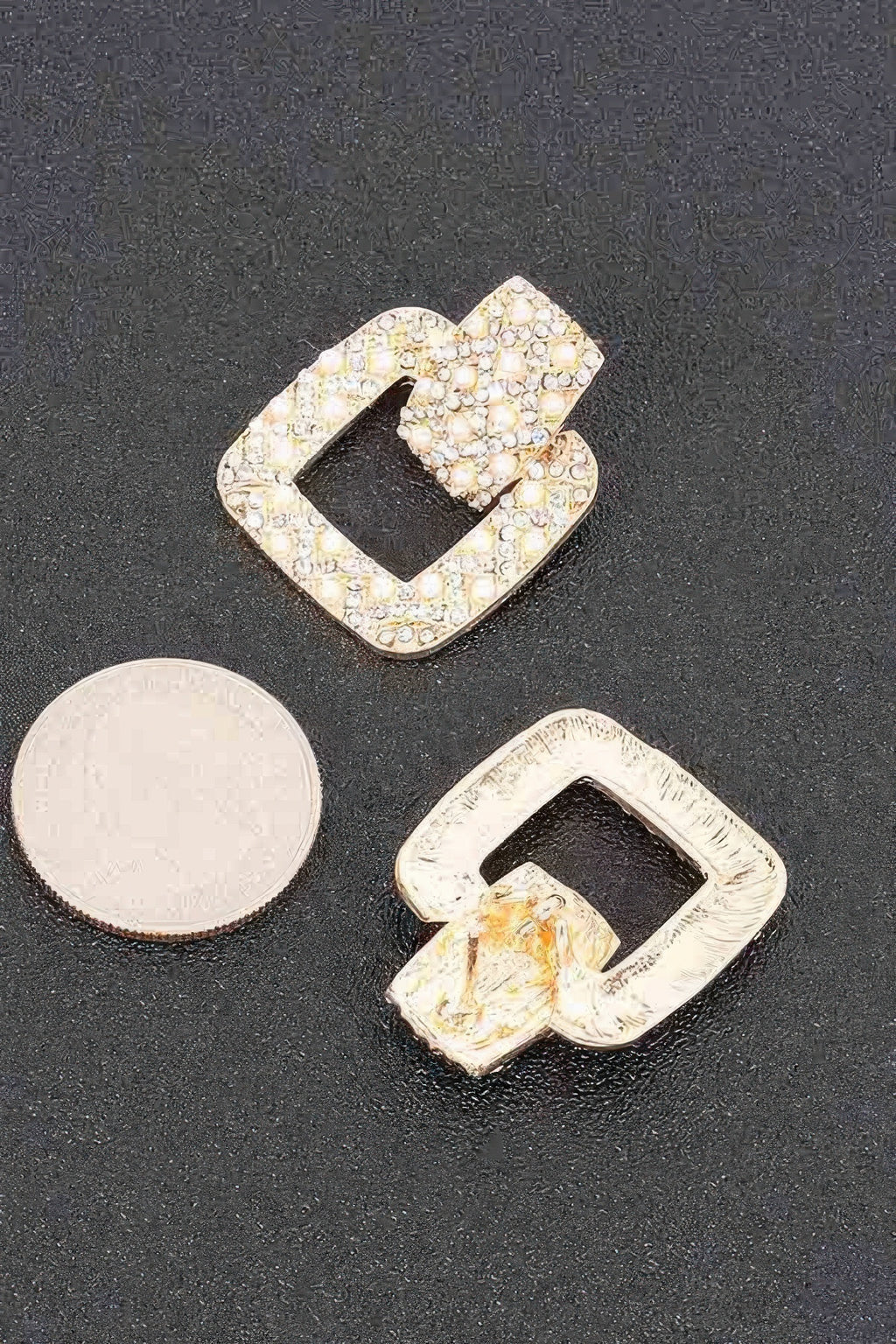 Gold rectangle link dangle earrings close-up with faux pearls and rhinestone edges
